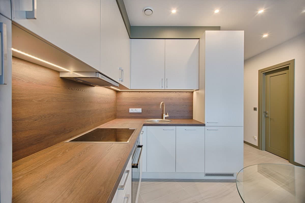 Plywood is a popular choice for kitchen and bathroom cabinets. It provides a stable and flat surface for mounting cabinet doors and shelves, and it resists warping and moisture damage when properly sealed.